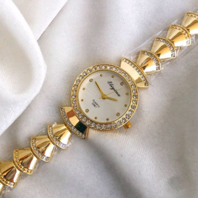 ساعت زنانه طلایی صفحه گرد