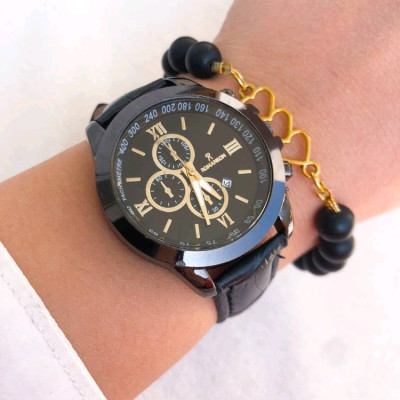 ساعت زنانه بند چرم مشکی به همراه دستبند